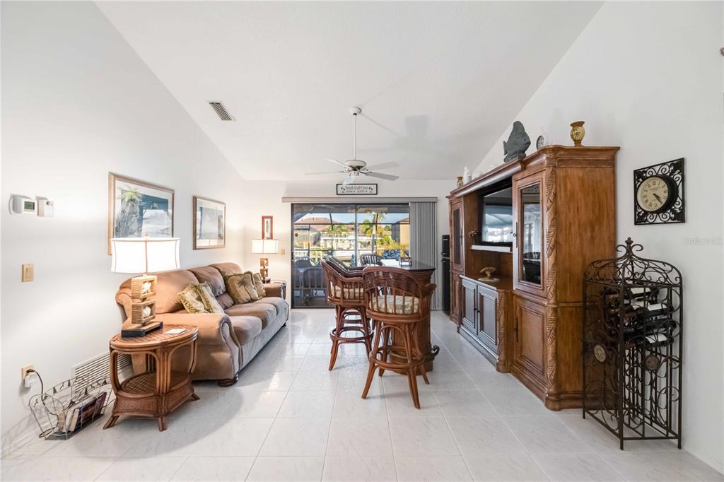 10534 Alpaca Circle Port Charlotte, FL 33981 - Photo 15 of 67 a living room with furniture and a flat screen tv