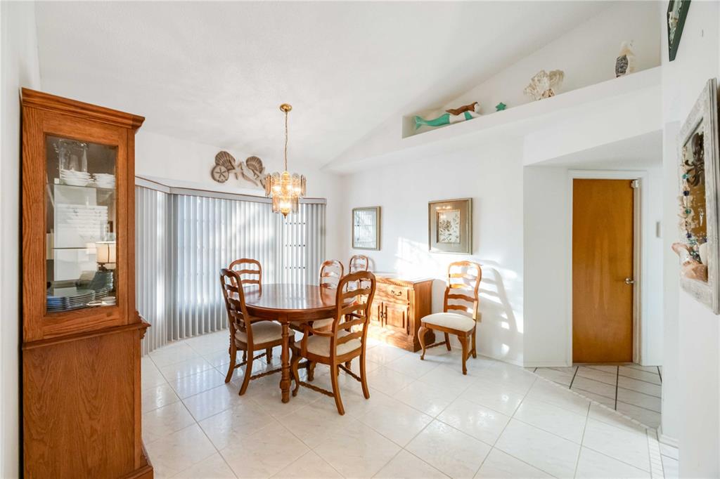 10534 Alpaca Circle Port Charlotte, FL 33981 - Photo 16 of 67 a dining room with furniture and window