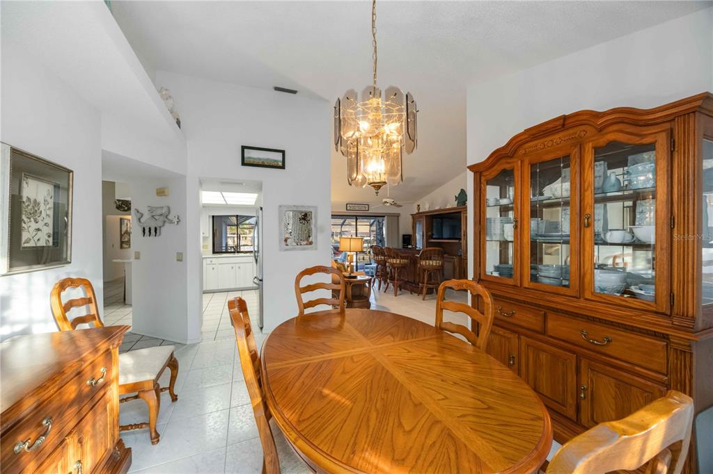 10534 Alpaca Circle Port Charlotte, FL 33981 - Photo 18 of 67 a view of a dining room with furniture window and outside view