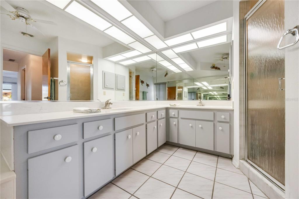 10534 Alpaca Circle Port Charlotte, FL 33981 - Photo 23 of 67 a spacious bathroom with a granite countertop sink mirror and