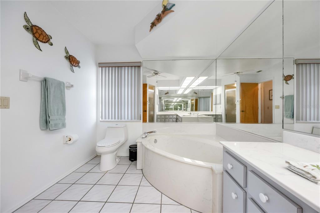 10534 Alpaca Circle Port Charlotte, FL 33981 - Photo 24 of 67 a bathroom with a sink a toilet and shower