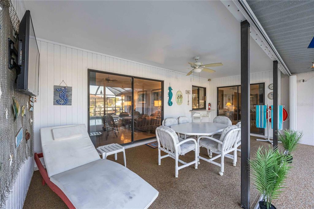 10534 Alpaca Circle Port Charlotte, FL 33981 - Photo 34 of 67 a view of a dining room with furniture window and outside view