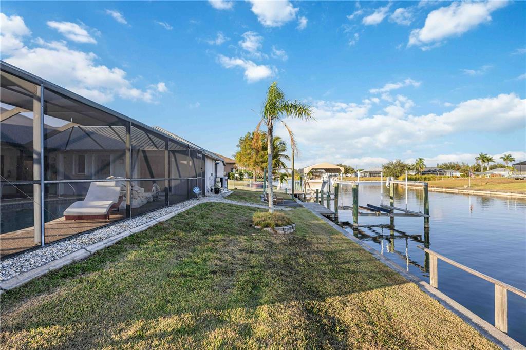 10534 Alpaca Circle Port Charlotte, FL 33981 - Photo 46 of 67 a view of a houses with a yard