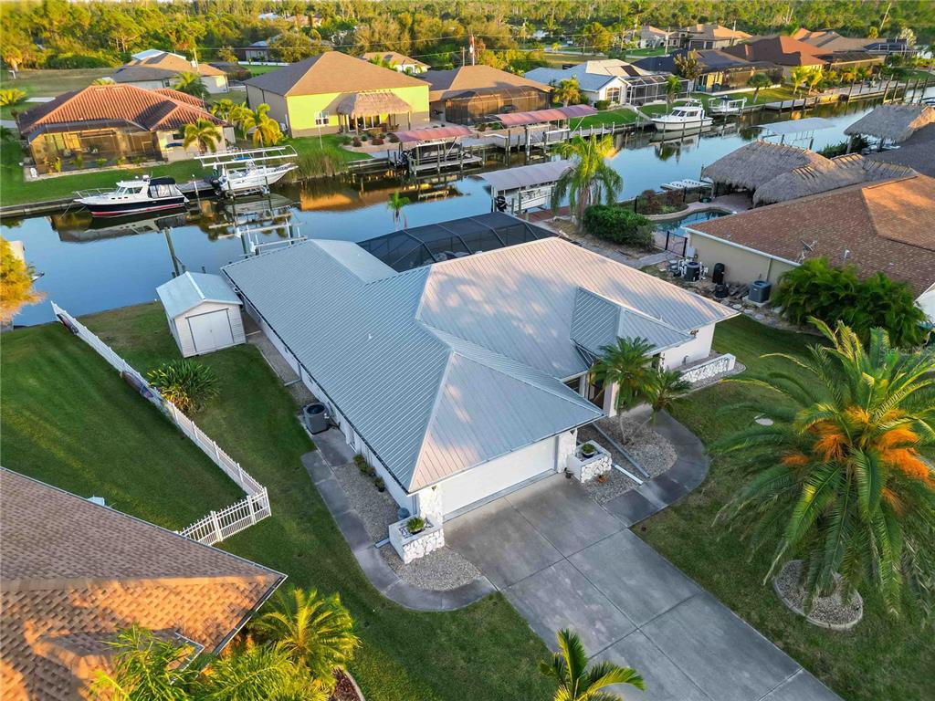 10534 Alpaca Circle Port Charlotte, FL 33981 - Photo 55 of 67 an aerial view of residential houses with outdoor space