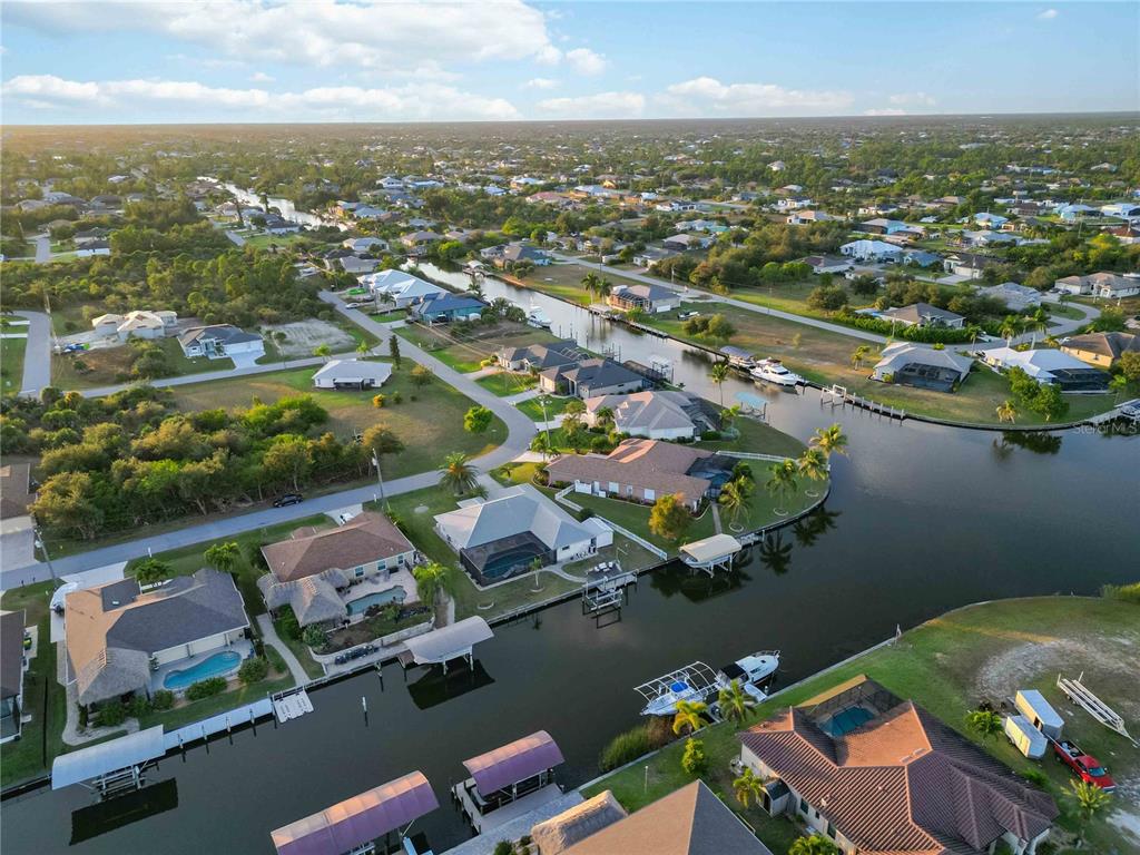 10534 Alpaca Circle Port Charlotte, FL 33981 - Photo 58 of 67 an aerial view of residential houses with outdoor space