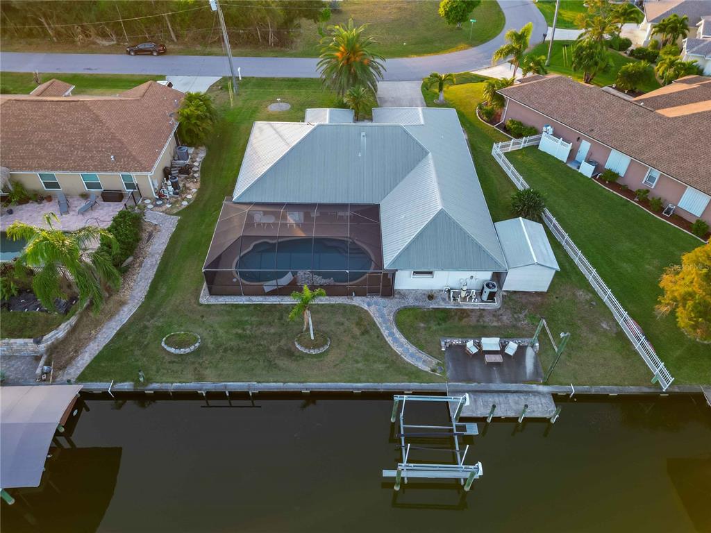 10534 Alpaca Circle Port Charlotte, FL 33981 - Photo 62 of 67 an aerial view of a house with a garden