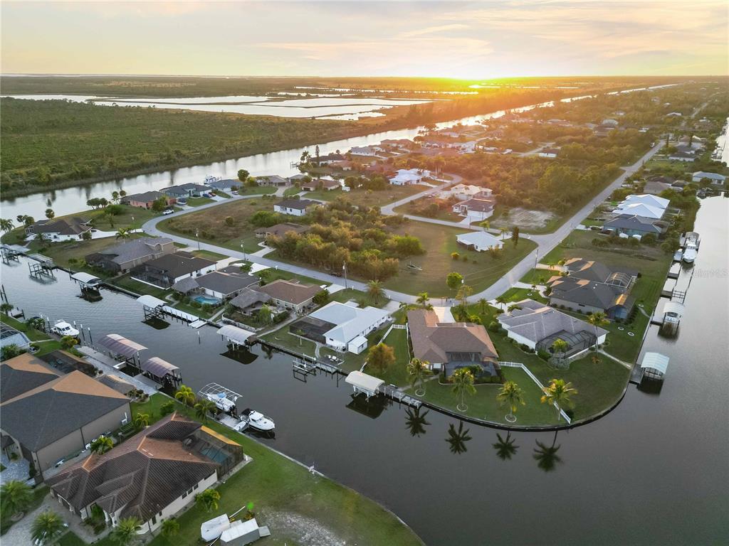 10534 Alpaca Circle Port Charlotte, FL 33981 - Photo 64 of 67 an aerial view of residential houses with outdoor space