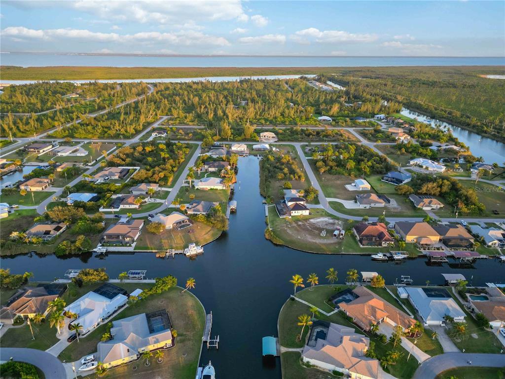 10534 Alpaca Circle Port Charlotte, FL 33981 - Photo 66 of 67 an aerial view of residential houses with outdoor space