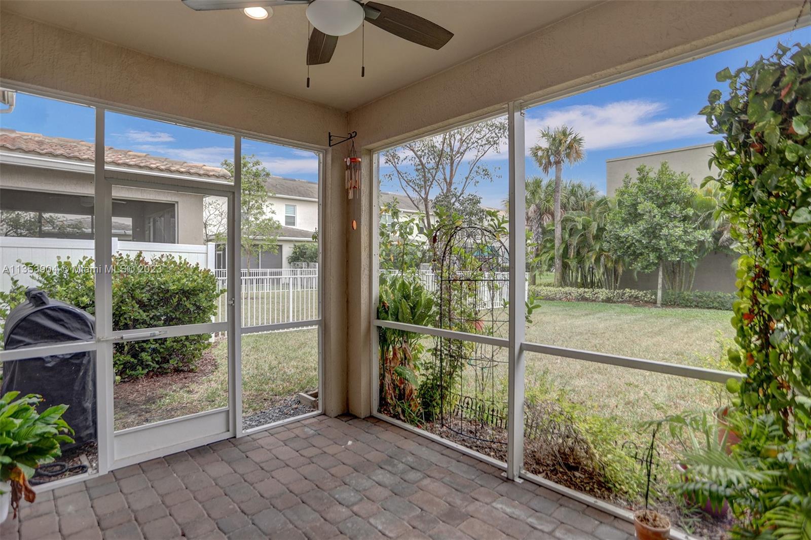 4764 Eucalyptus Drive, Unit 4764 Hollywood, FL 33021 - Photo 13 of 54 a view of a room with a large window and wooden floor