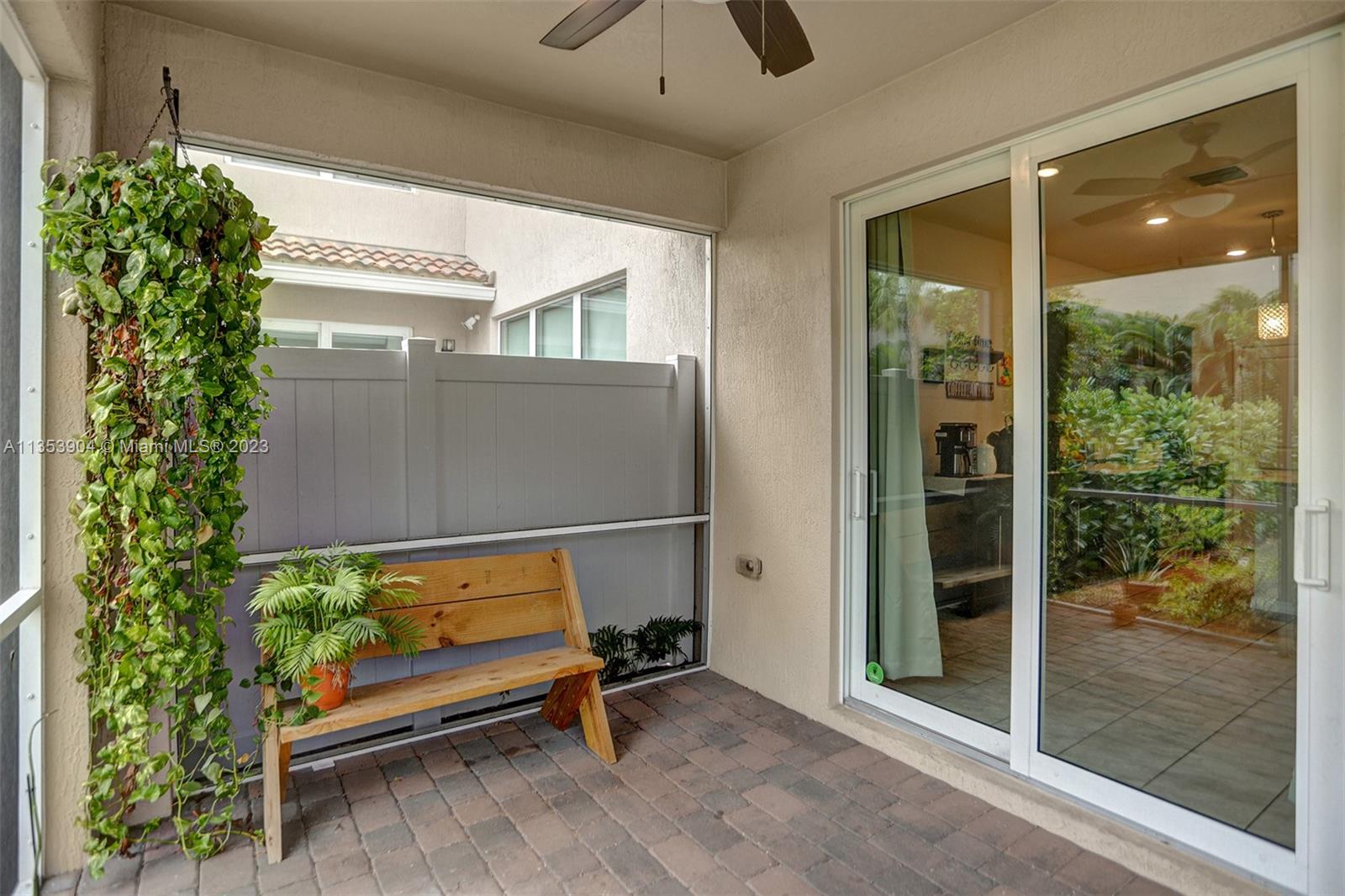 4764 Eucalyptus Drive, Unit 4764 Hollywood, FL 33021 - Photo 15 of 54 a bench sitting in front of a window
