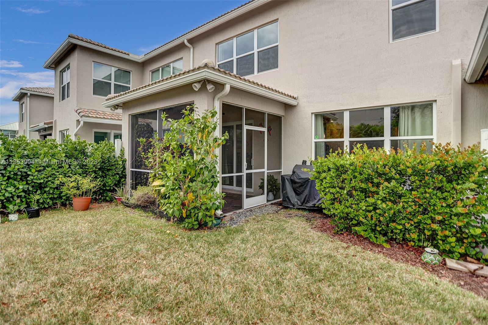 4764 Eucalyptus Drive, Unit 4764 Hollywood, FL 33021 - Photo 17 of 54 front view of a house with potted plants