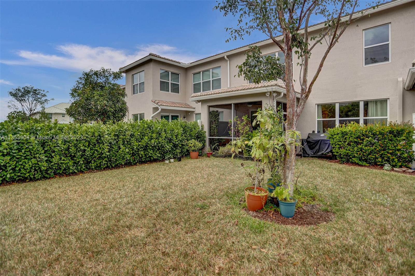 4764 Eucalyptus Drive, Unit 4764 Hollywood, FL 33021 - Photo 18 of 54 a view of a house with backyard garden and porch