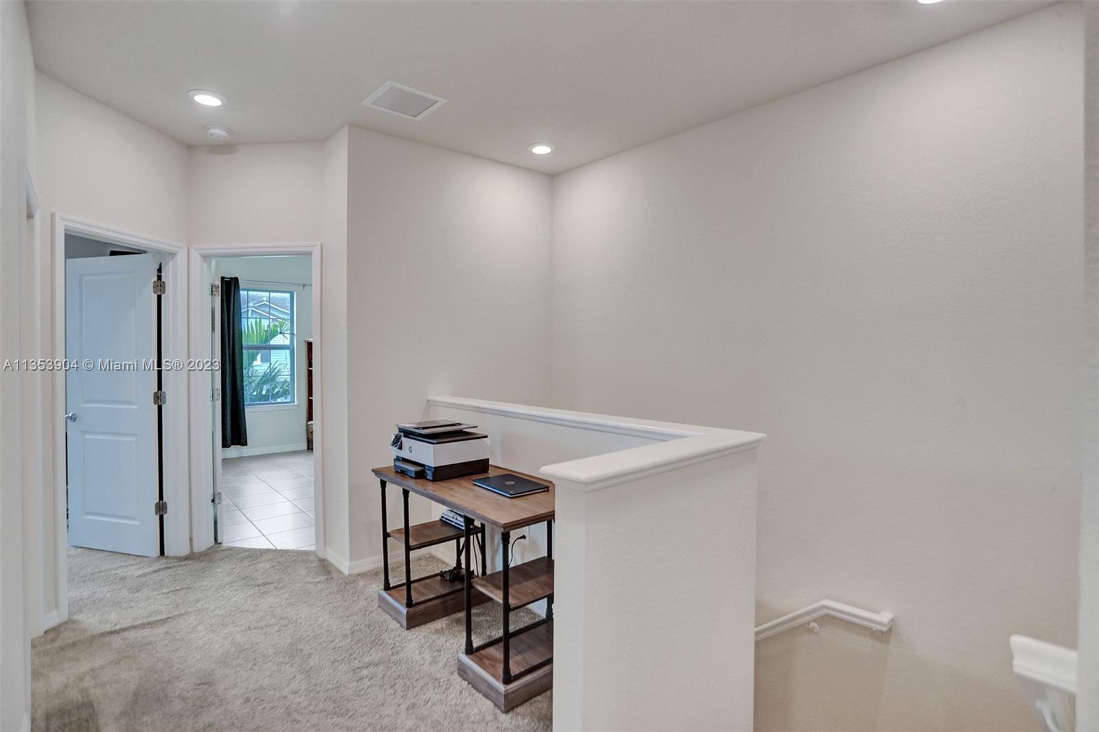 4764 Eucalyptus Drive, Unit 4764 Hollywood, FL 33021 - Photo 26 of 54 a view of a hallway with seating area
