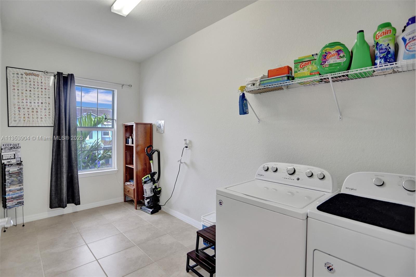 4764 Eucalyptus Drive, Unit 4764 Hollywood, FL 33021 - Photo 27 of 54 a view of storage and utility room with washer and dryer