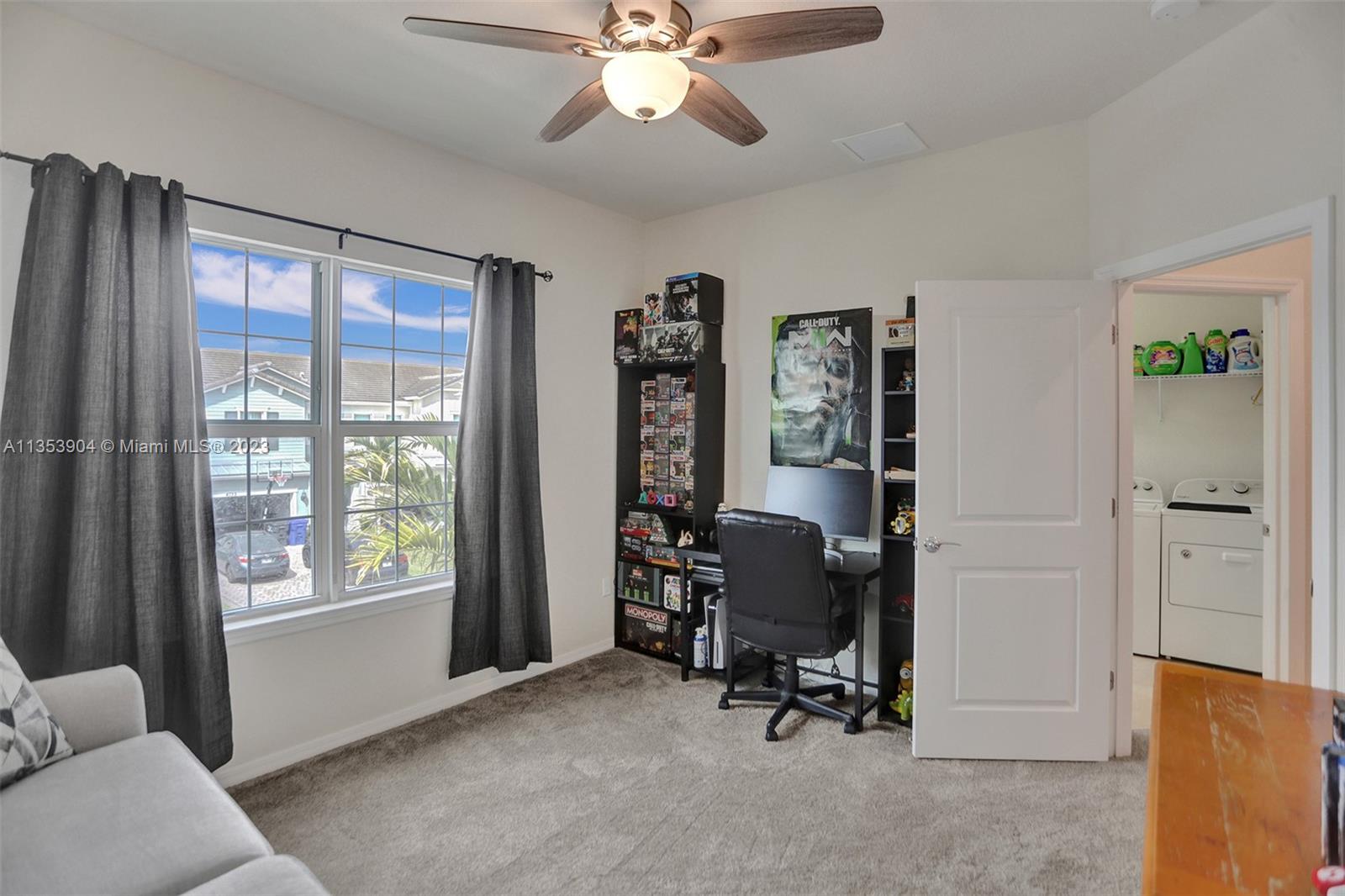 4764 Eucalyptus Drive, Unit 4764 Hollywood, FL 33021 - Photo 30 of 54 a view of a livingroom with workspace and a window