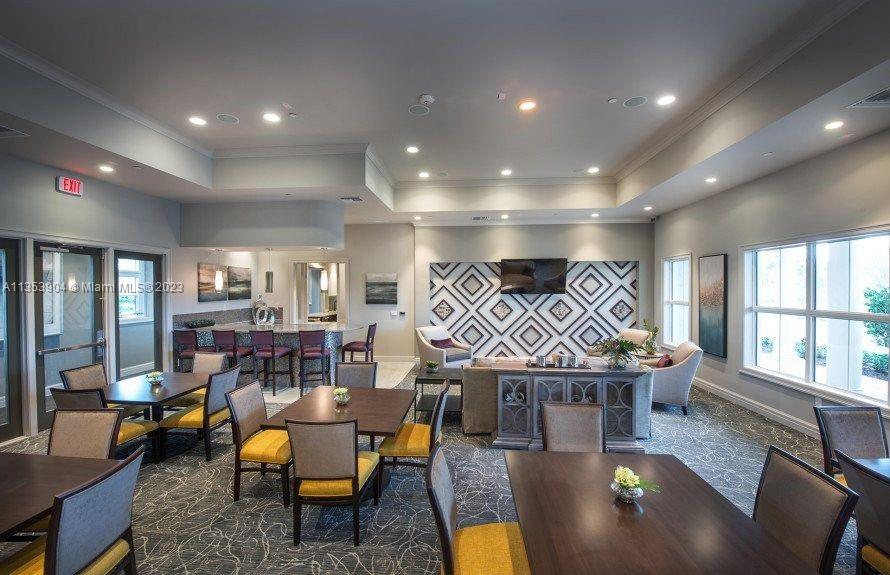 4764 Eucalyptus Drive, Unit 4764 Hollywood, FL 33021 - Photo 47 of 54 a living room with furniture and kitchen view