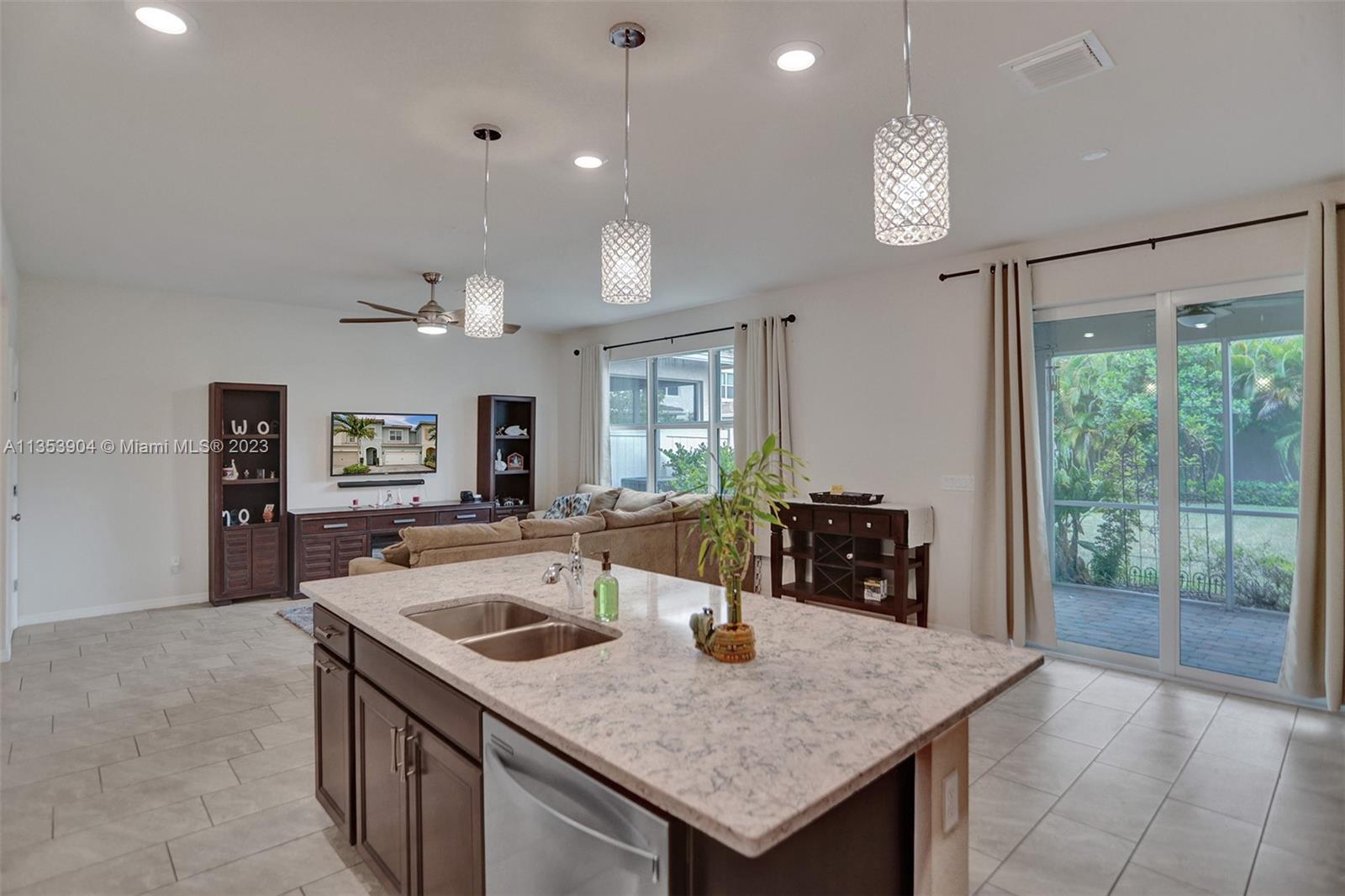 4764 Eucalyptus Drive, Unit 4764 Hollywood, FL 33021 - Photo 9 of 54 a kitchen with a counter top space and a sink