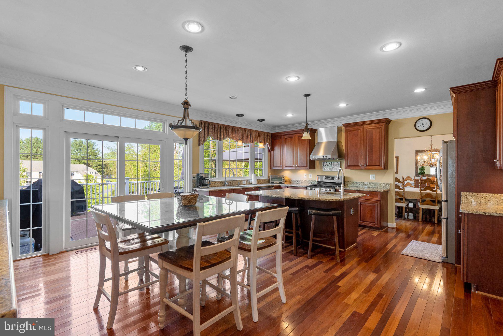 19009 Old Baltimore Road Brookeville, MD 20833 - Photo 18 of 96 Sliding doors from kitchen to deck and rear yard.