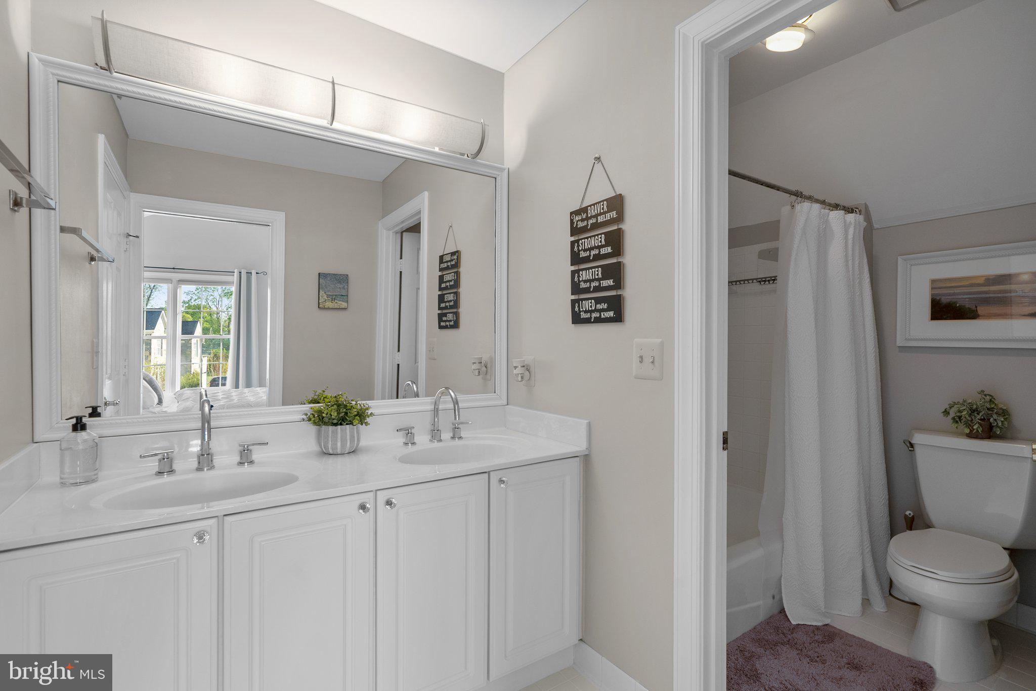 19009 Old Baltimore Road Brookeville, MD 20833 - Photo 38 of 96 Full upper level hall bath with double sinks.