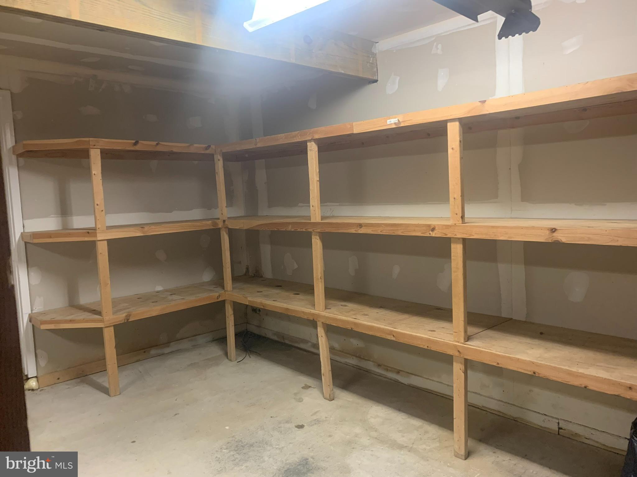 19009 Old Baltimore Road Brookeville, MD 20833 - Photo 54 of 96 Great storage room with shelving.