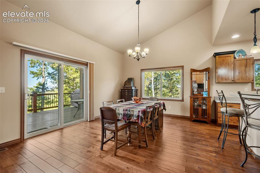 131 Paradiso Road Divide, CO 80814 - Photo 17 of 50 a view of a dining room with furniture window and wooden floor