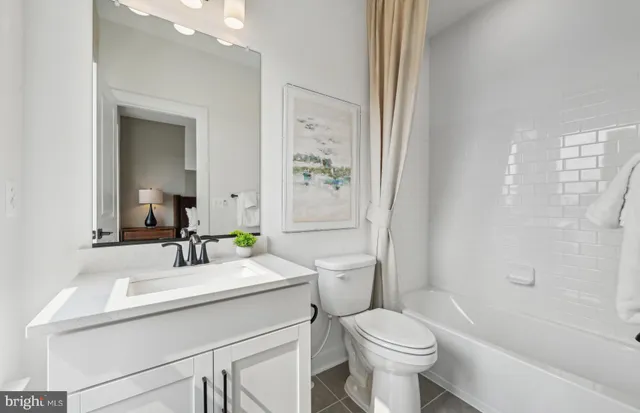 a picture of a bench in a bathroom