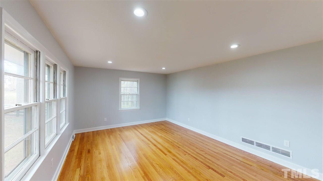 108 Rand Road Raleigh, NC 27603 - Photo 2 of 29 Bright and beautiful Formal living room has many uses today. Office, playroom, workout space or perhaps an elegant boudoir. Recessed lighting adds to the glow from the natural daylight that pours in.