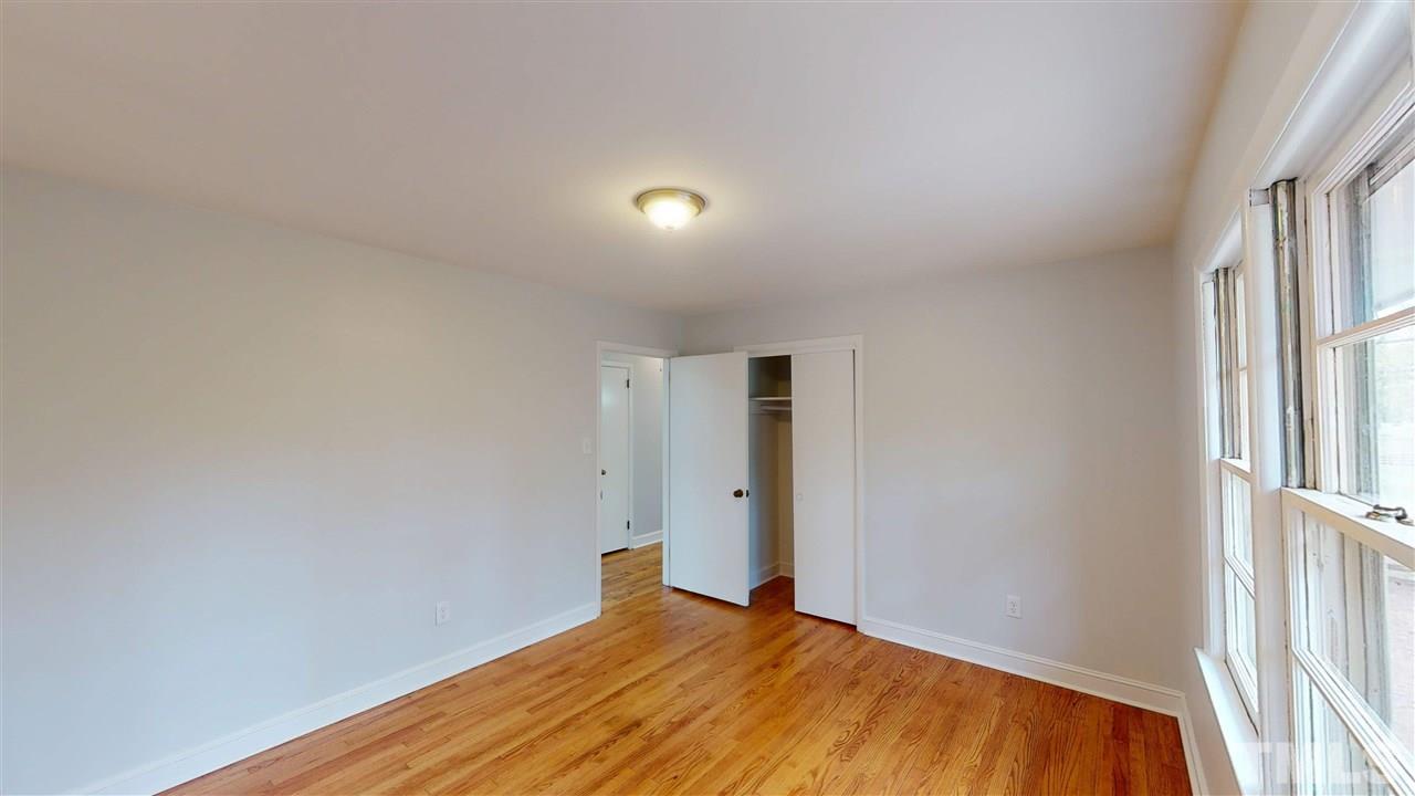 108 Rand Road Raleigh, NC 27603 - Photo 12 of 29 Delightful bedroom has double door closet, hardwood floors, and fabulous view. Someone will be excited to get this room. :)