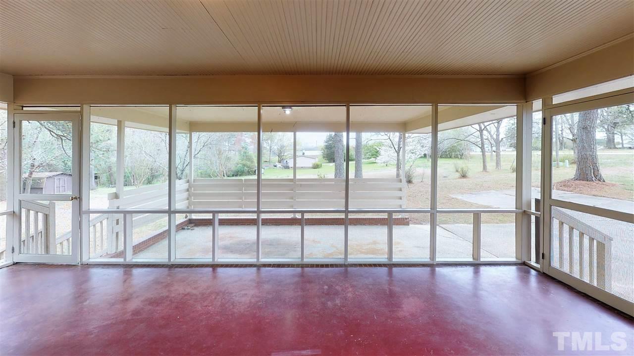108 Rand Road Raleigh, NC 27603 - Photo 23 of 29 For your outdoor pleasure...the screened porch. Great views of both front and back yards.