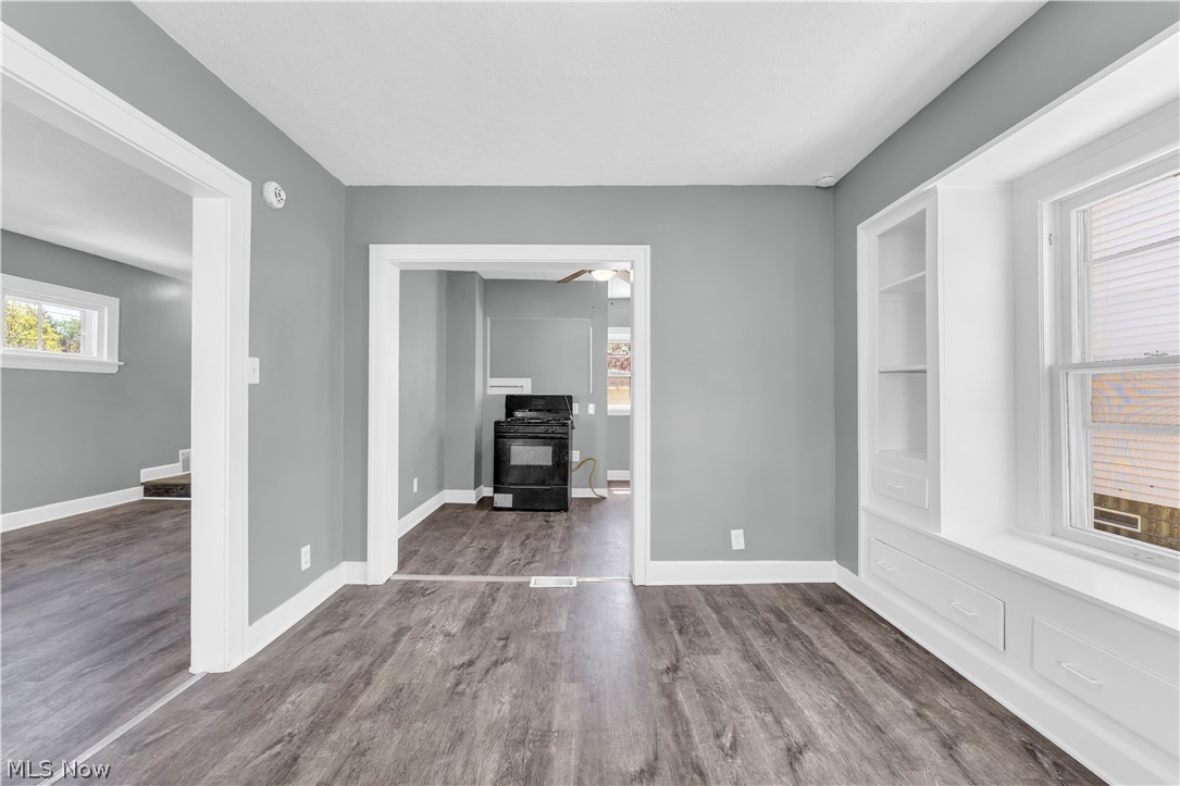 12808 Havana Road Cleveland, OH 44125 - Photo 6 of 19 Bright interior space featuring wood-finish flooring and light gray walls
