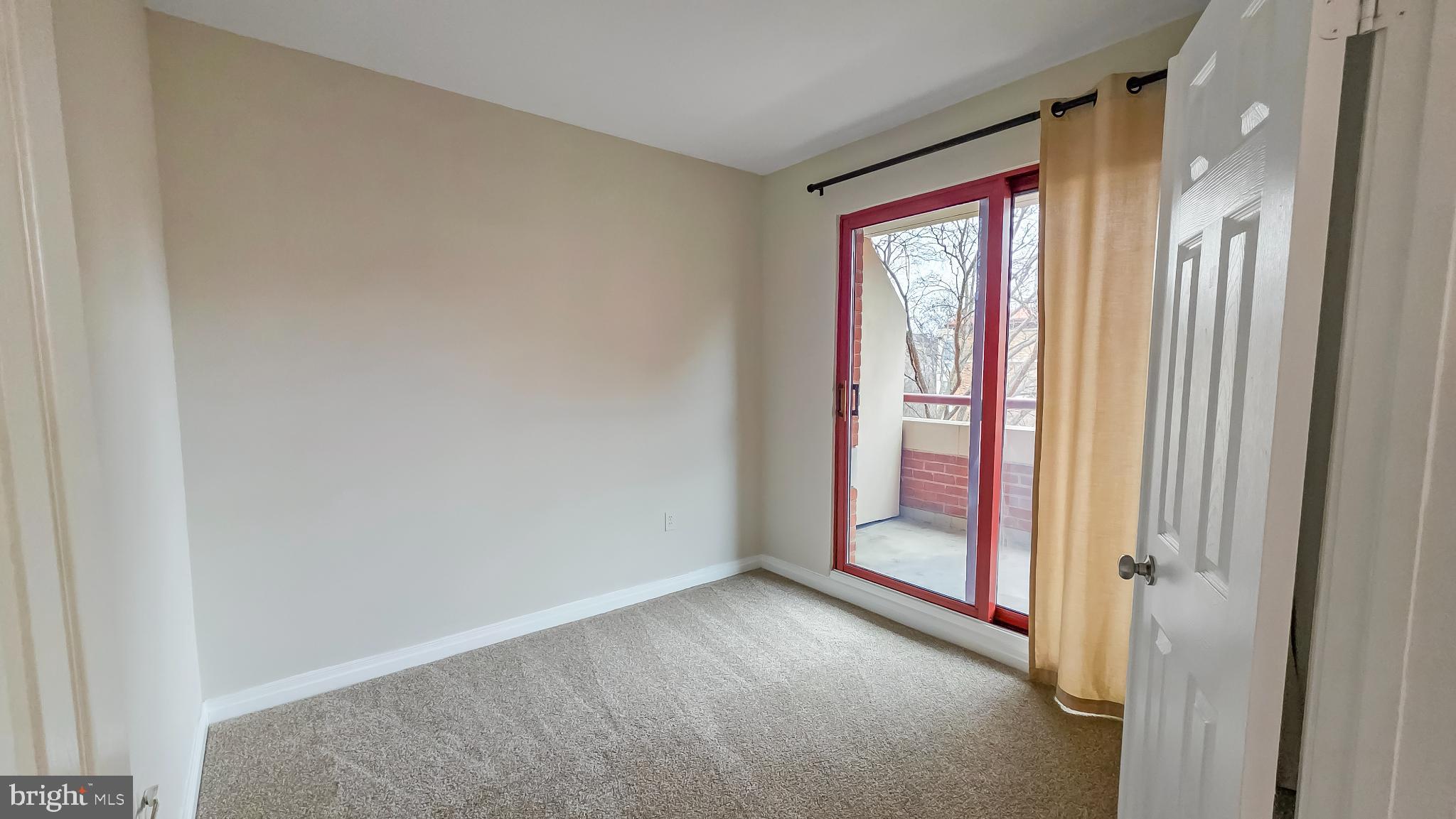 2301 N Street Northwest, Unit 404 Washington, DC 20037 - Photo 12 of 21 a view of an empty room and window