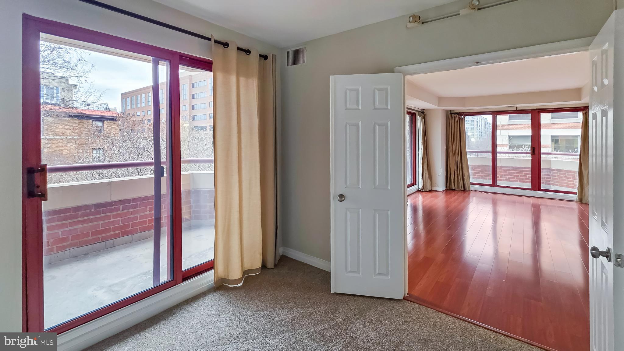 2301 N Street Northwest, Unit 404 Washington, DC 20037 - Photo 13 of 21 a view of front door with wooden floor