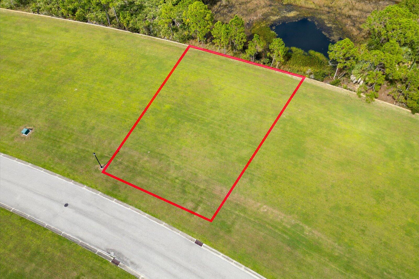 149 Southeast Tramonto Street Port St. Lucie, FL 34984 - Photo 3 of 8 a view of a swimming pool with an outdoor space