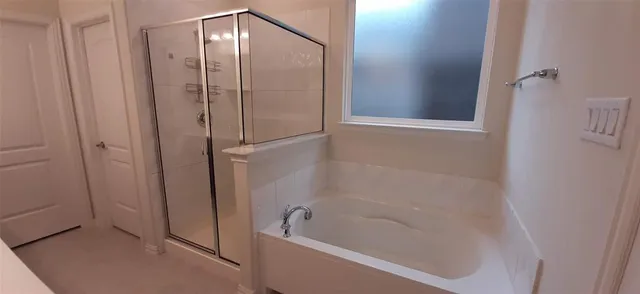 a bathroom with a bathtub