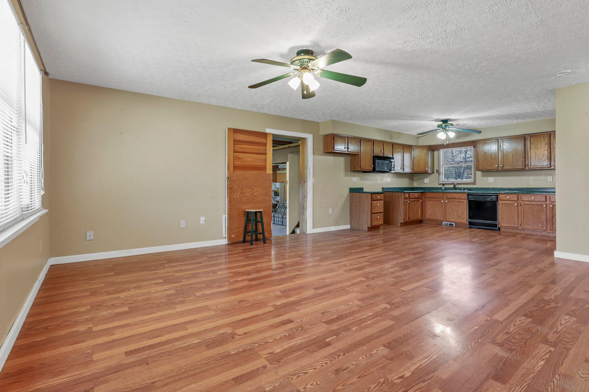 5225 Deeds Road Southwest Pataskala, OH 43062 - Photo 10 of 43 Living room w/'open kitchen