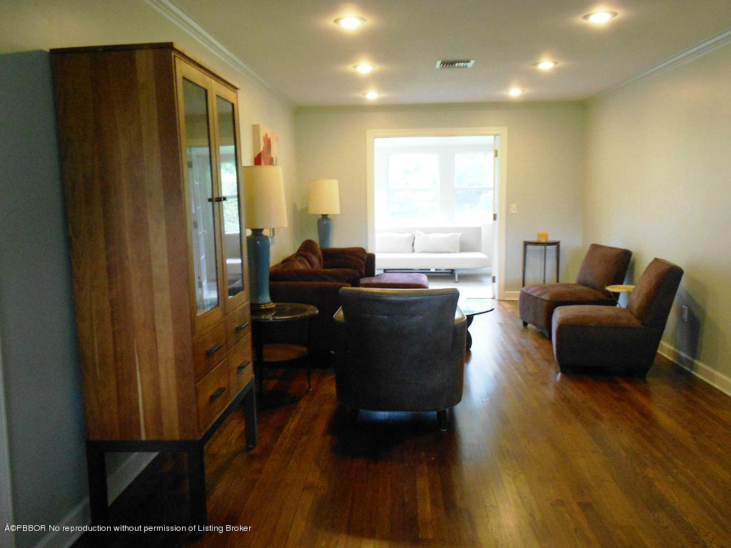 314 Westminster Road West Palm Beach, FL 33405 - Photo 2 of 9 a living room with furniture wooden floor and a window