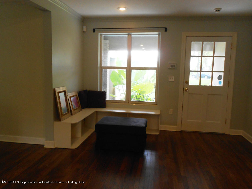 314 Westminster Road West Palm Beach, FL 33405 - Photo 8 of 9 a living room with furniture and wooden floor