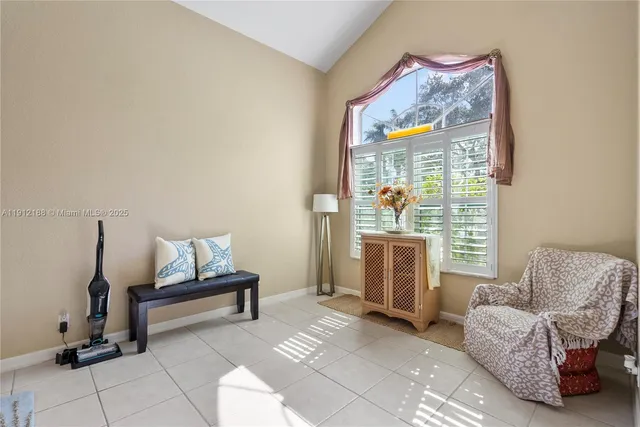 a view of a living room and dining room