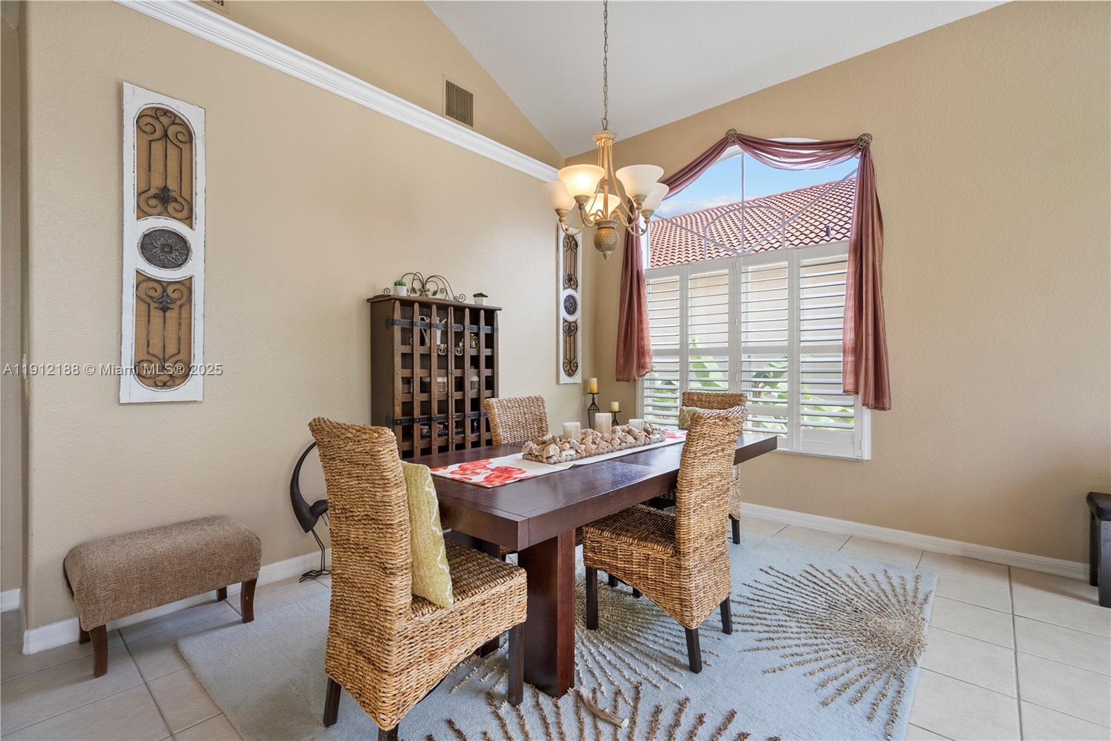2795 Southeast Stonebriar Way Stuart, FL 34997 - Photo 17 of 54 a dining room with furniture and window
