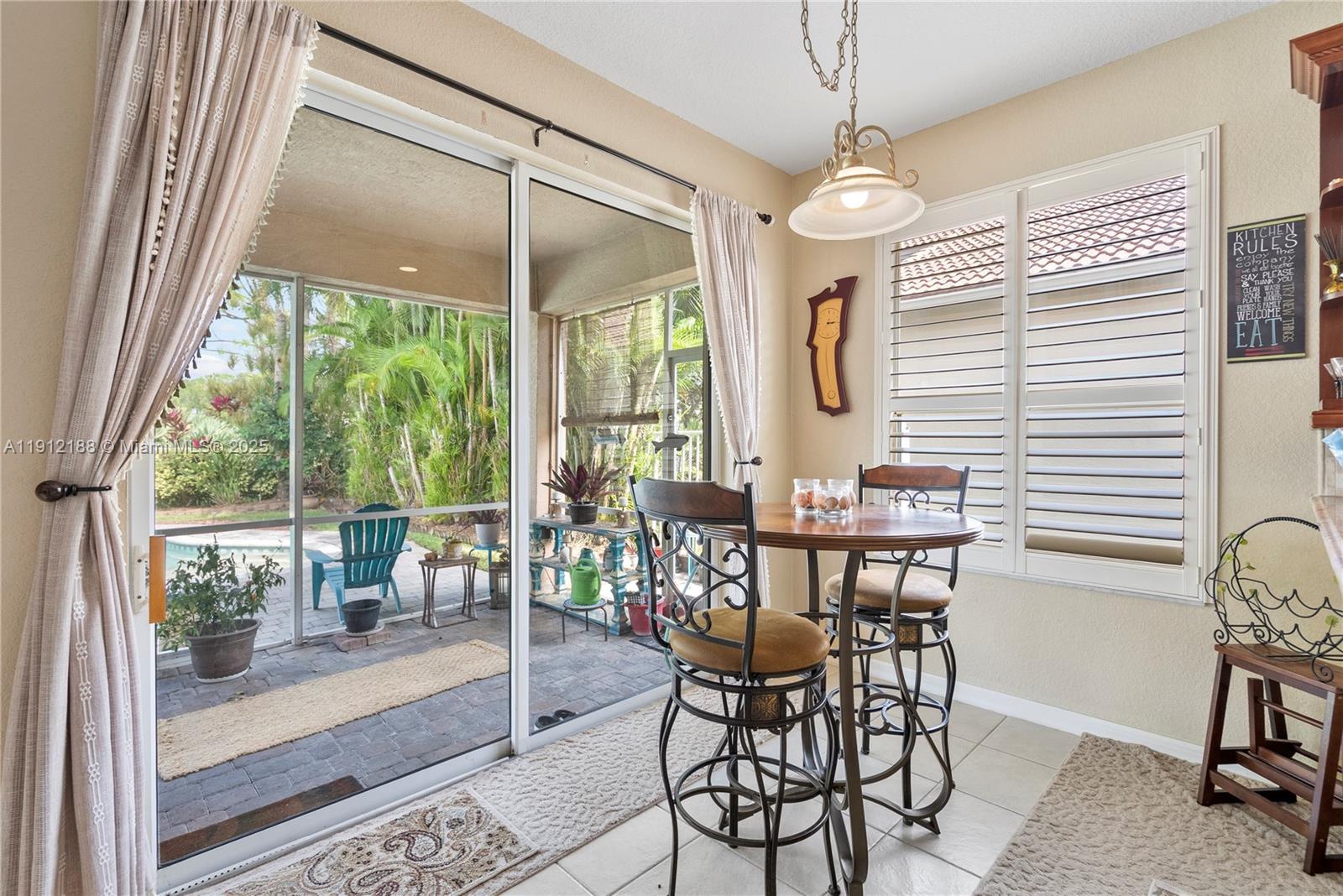 2795 Southeast Stonebriar Way Stuart, FL 34997 - Photo 30 of 54 a view of a dining room with furniture window and outside view