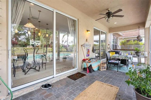 a view of a swimming pool with a patio