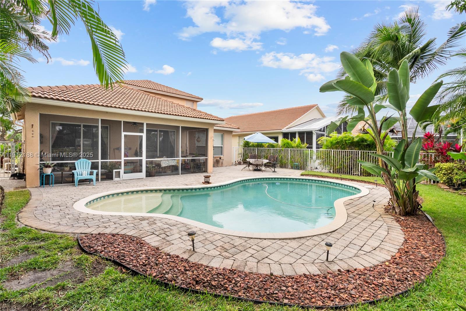 2795 Southeast Stonebriar Way Stuart, FL 34997 - Photo 39 of 54 a view of a swimming pool with a patio