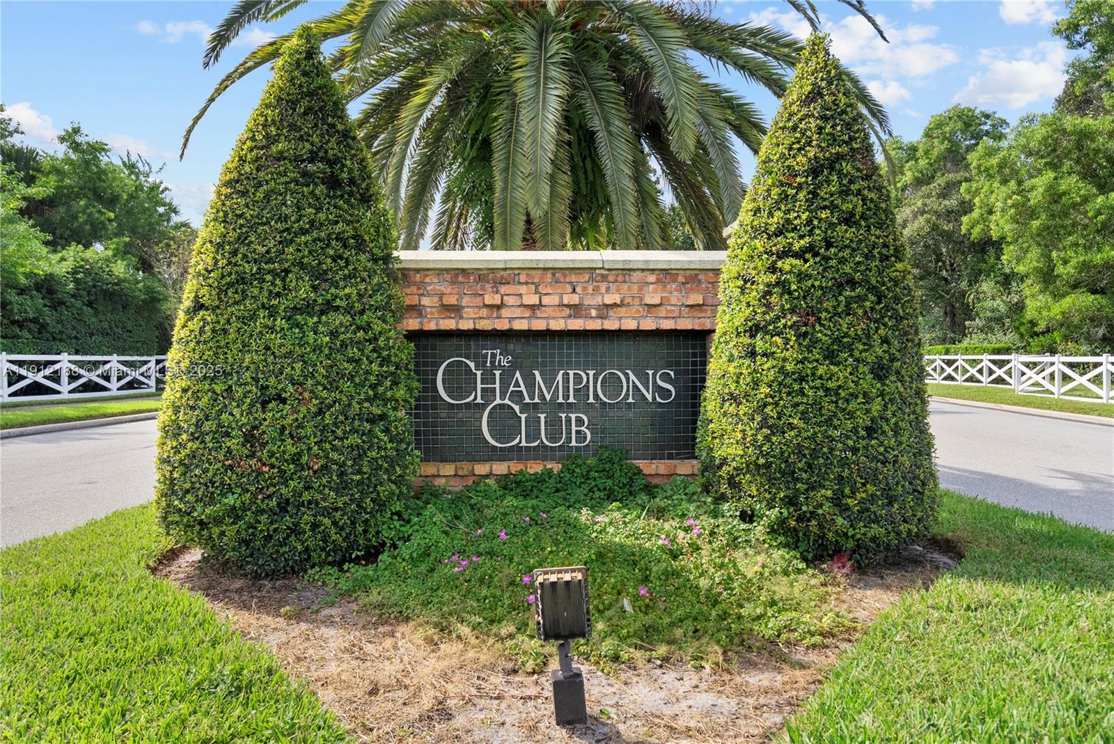 2795 Southeast Stonebriar Way Stuart, FL 34997 - Photo 54 of 54 a sign that is sitting on a brick wall