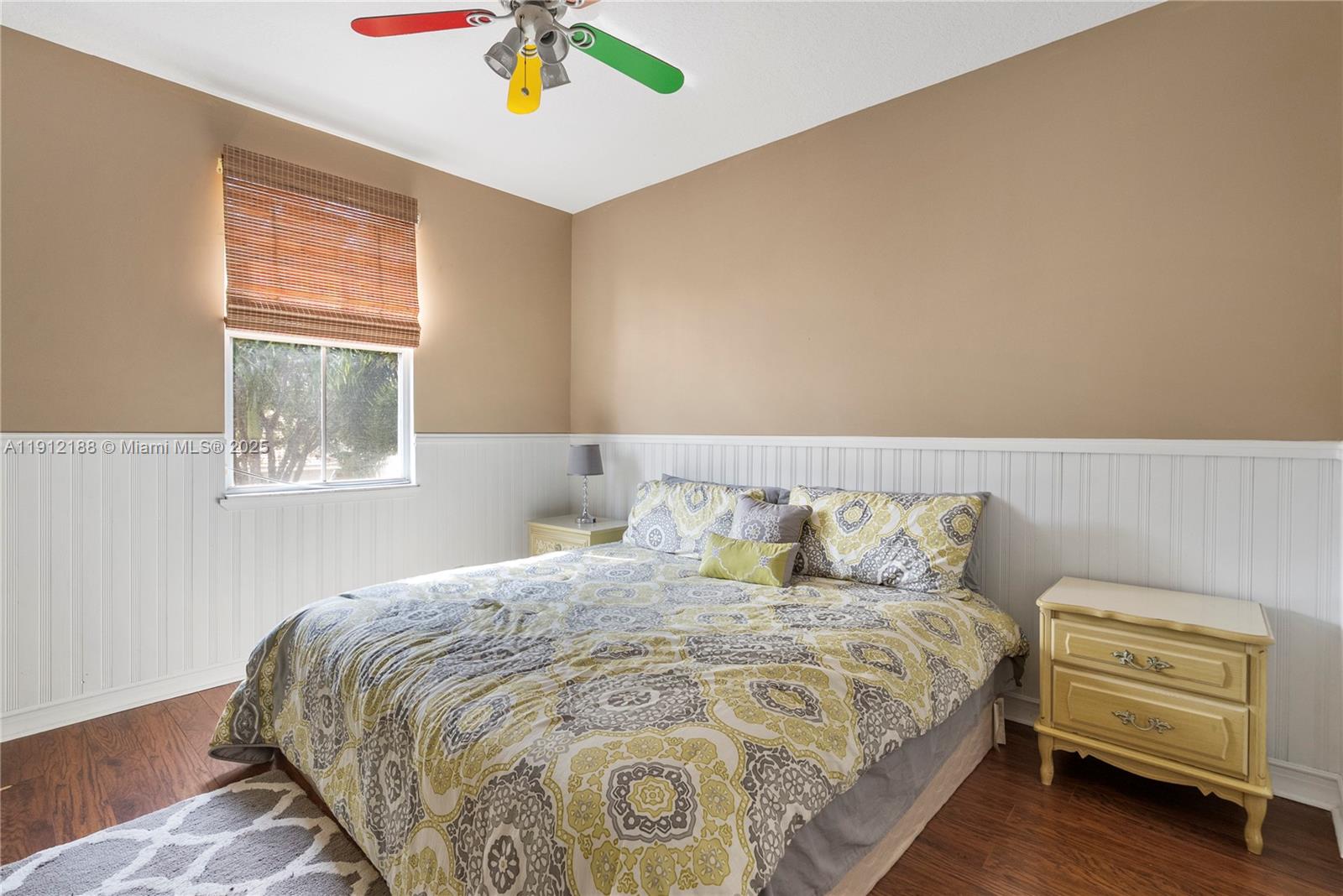 2795 Southeast Stonebriar Way Stuart, FL 34997 - Photo 10 of 54 a bedroom with a bed and a window