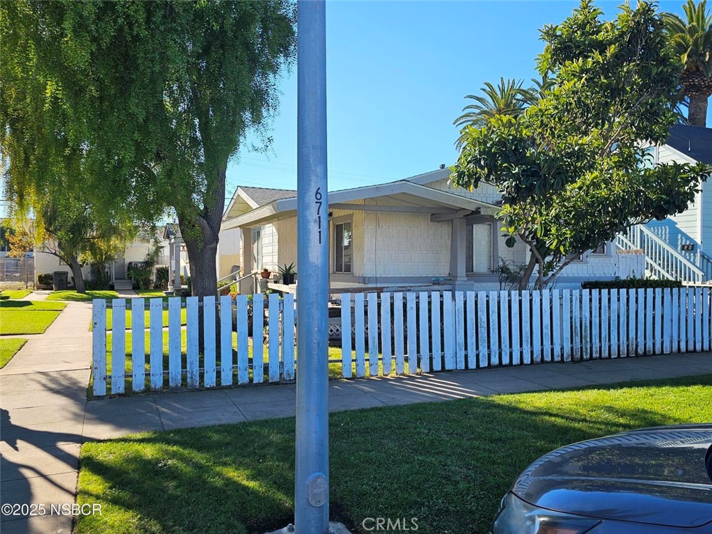 304 East Fesler Street Santa Maria, CA 93454 - Photo 2 of 7 a view of a wooden deck with a yard