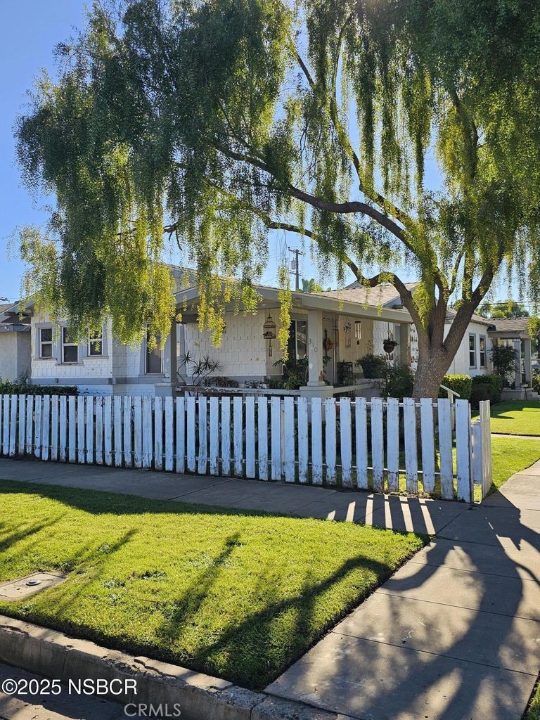 304 East Fesler Street Santa Maria, CA 93454 - Photo 3 of 7 a view of a backyard with a small pool