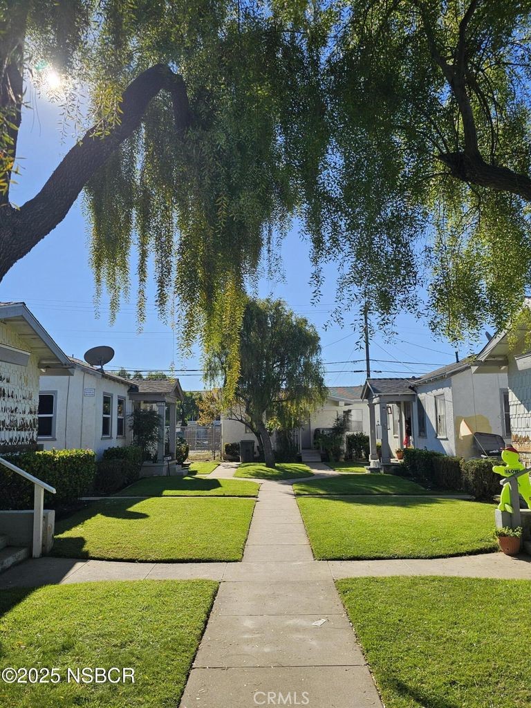 304 East Fesler Street Santa Maria, CA 93454 - Photo 5 of 7 a view of a house with a swimming pool