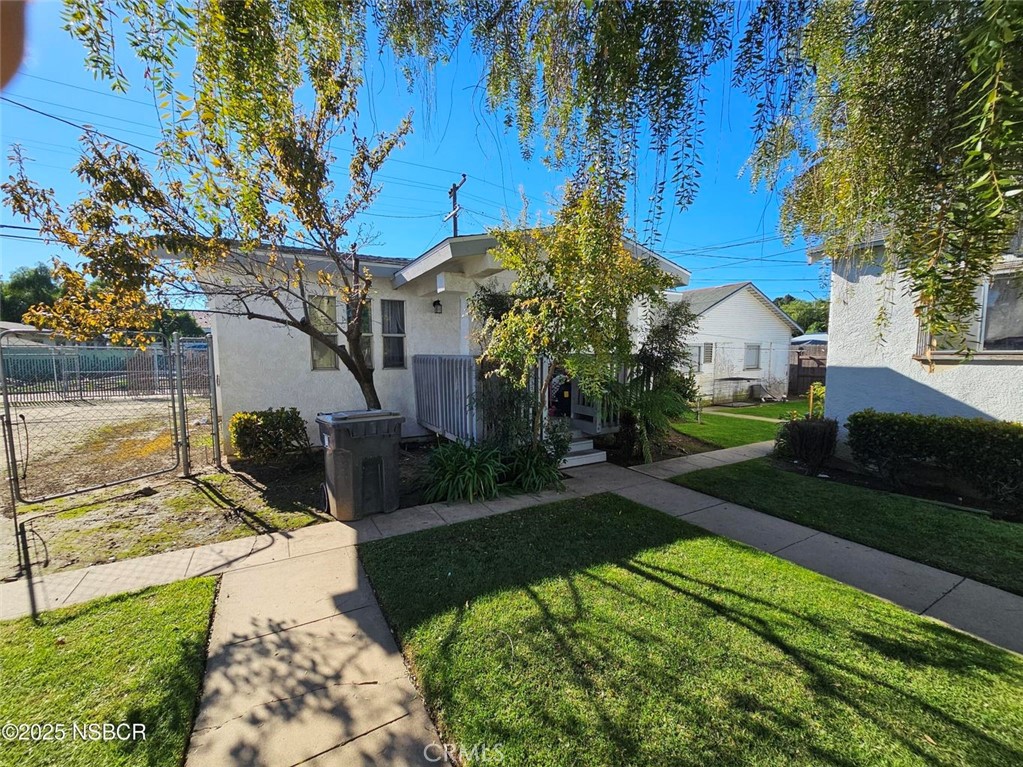 304 East Fesler Street Santa Maria, CA 93454 - Photo 6 of 7 a view of a house with a yard