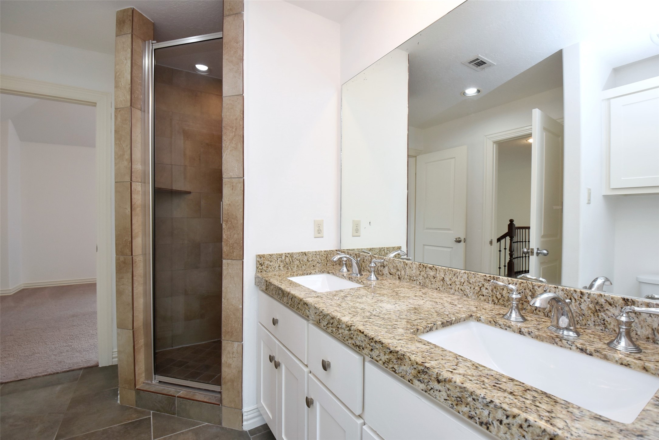 2014 Split Branch Court Houston, TX 77077 - Photo 23 of 47 a bathroom with a granite countertop sink and a mirror