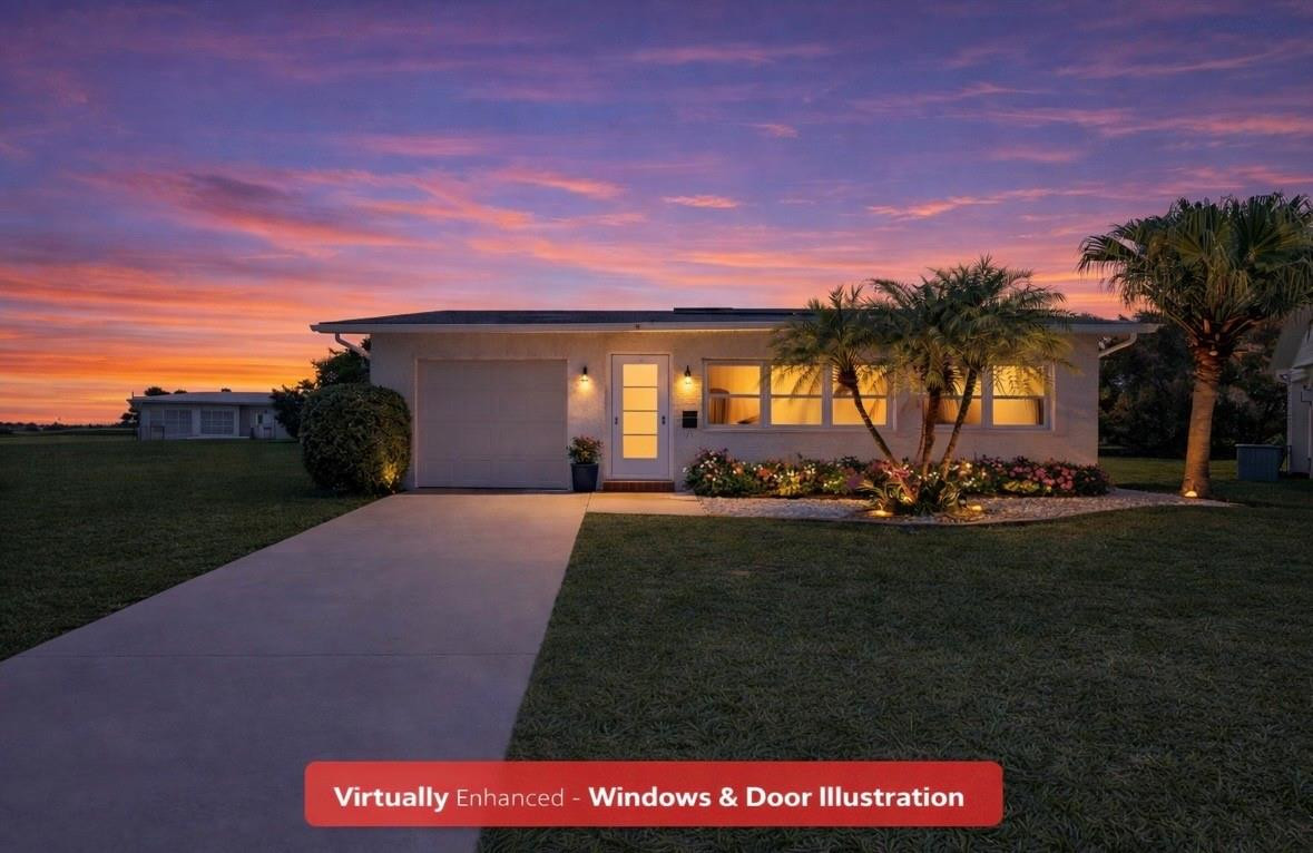 6755 Northwest 15th Street Margate, FL 33063 - Photo 3 of 11 a front view of house with yard and green space